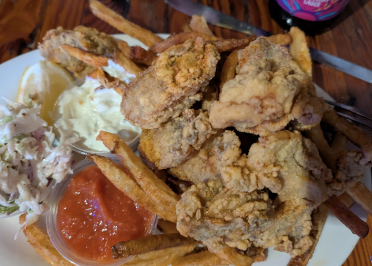 Coop's Place signature dishes Rabbit & Sausage Jambalaya
Cajun Fried Chicken
Seafood Gumbo